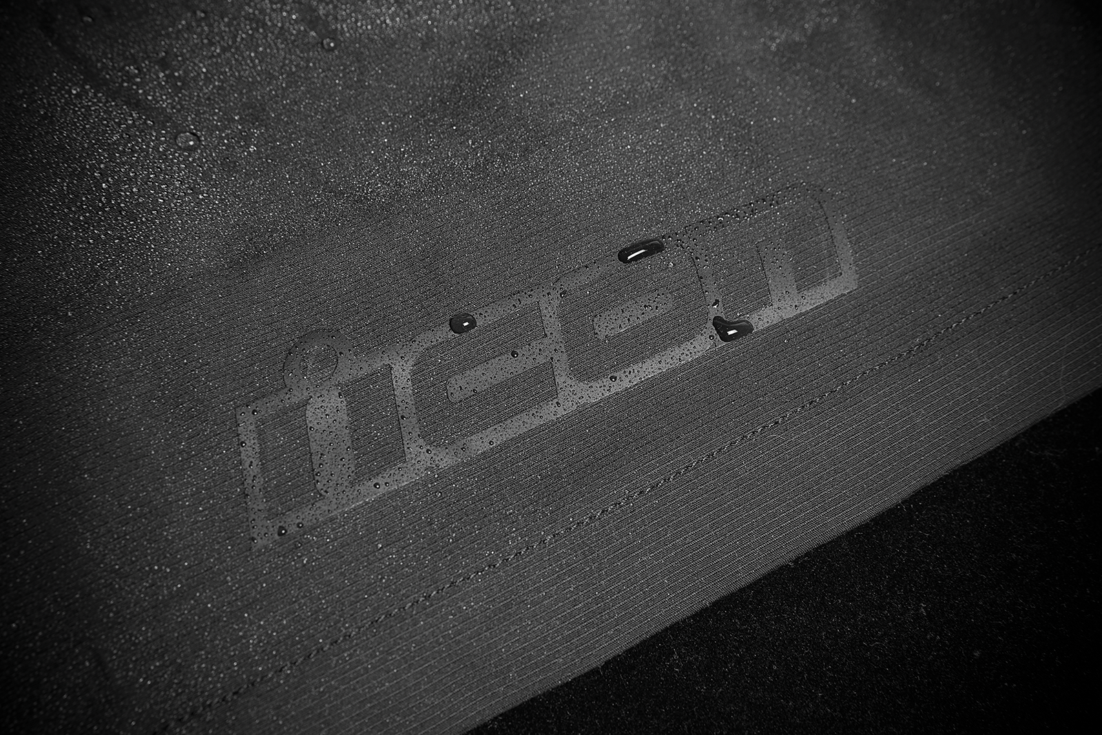 Black ICON Stormhawk Jacket CE in XL size, shown with detailed front view, featuring protective padding and sleek design.
