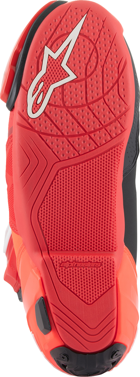 Alpinestars Supertech R motorcycle boots in red, US 9.5 / EU 44, with protective design and branding visible.