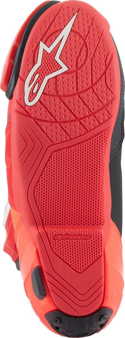 Alpinestars Supertech R motorcycle boots in red, US 9.5 / EU 44, with protective design and branding visible.