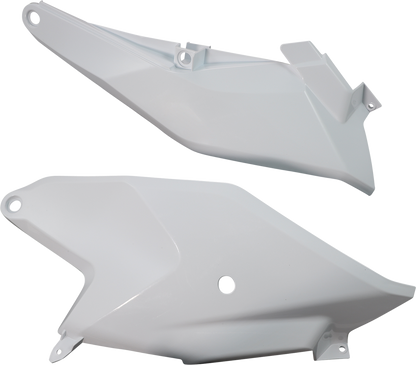 Acerbis white side panels for motorcycle body, showing sleek design and mounting points, compatible with various bike models.
