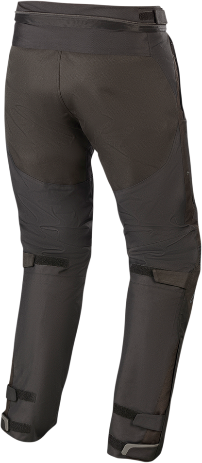 Black Alpinestars Raider v2 Drystar® motorcycle pants in 2XL, showing reinforced knees and durable textile construction.