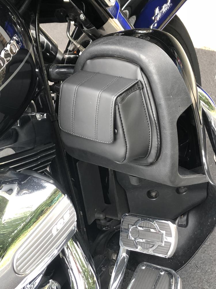 Kuryakyn fairing lower door pockets for Harley Davidson touring models, close-up of black plastic storage compartments.