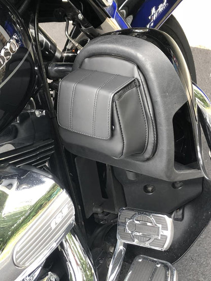 Kuryakyn fairing lower door pockets for Harley Davidson touring models, close-up of black plastic storage compartments.