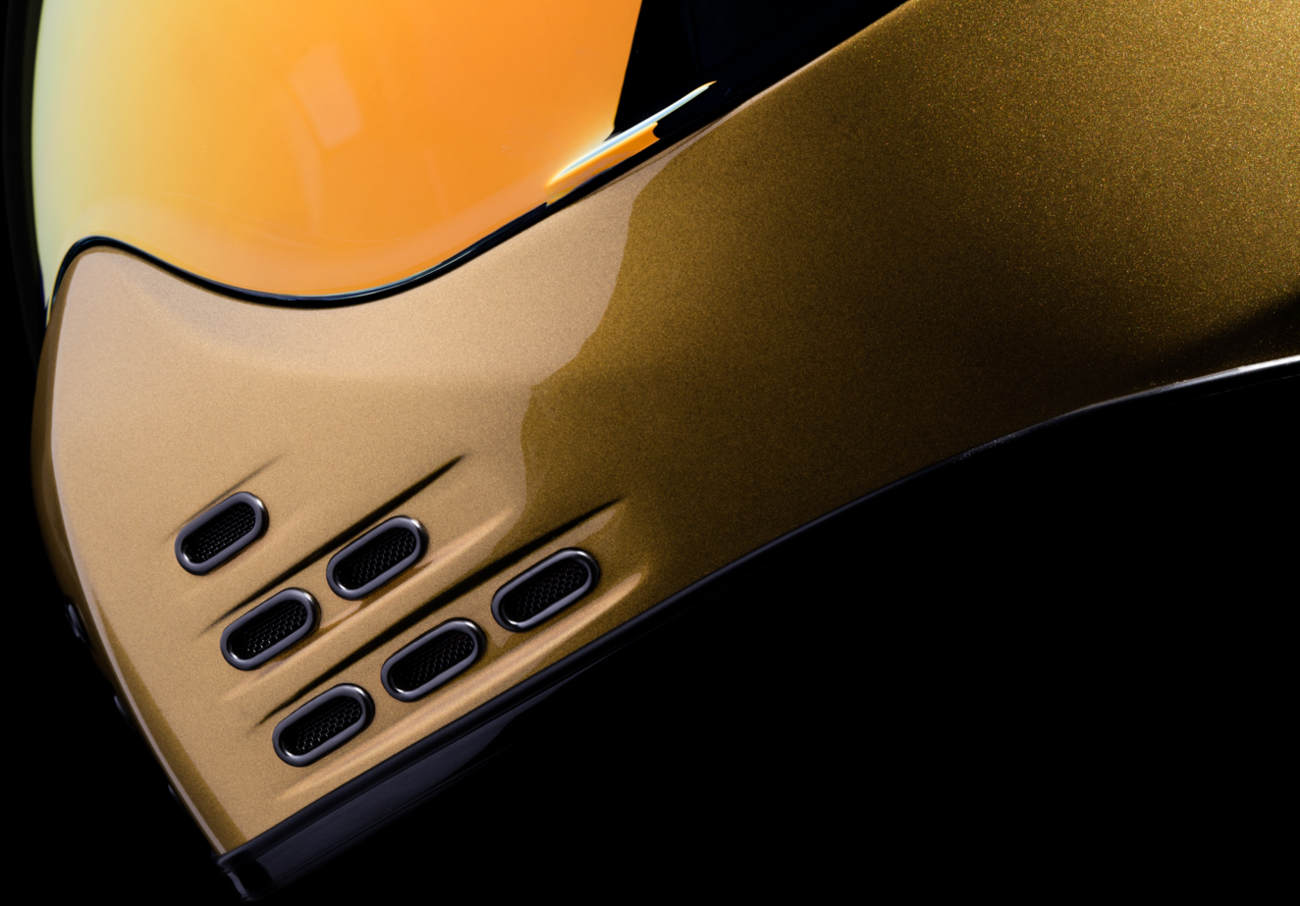ICON Domain™ Helmet Cornelius Gold small helmet with sleek design, visible vents, and glossy gold finish, by Bill's Exhausts.