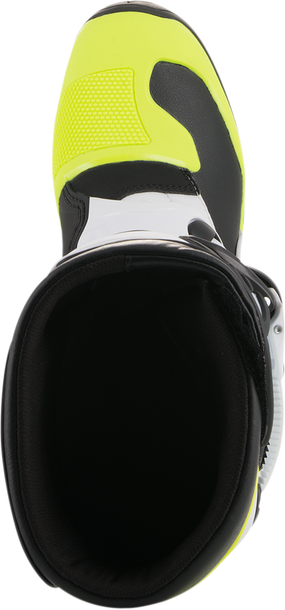 Alpinestars Tech 3S motocross boots in black, white, and fluorescent yellow showing sturdy construction and protective features.