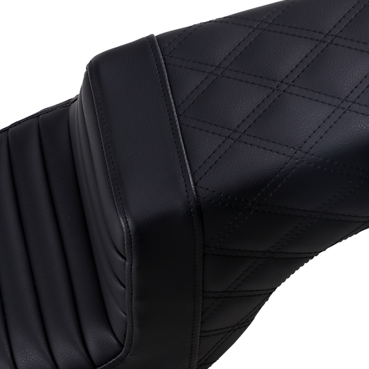 Black Saddlemens Step-Up Seat for motorcycles featuring front tuck-n-roll and rear lattice stitch design, by Bill's Exhausts.