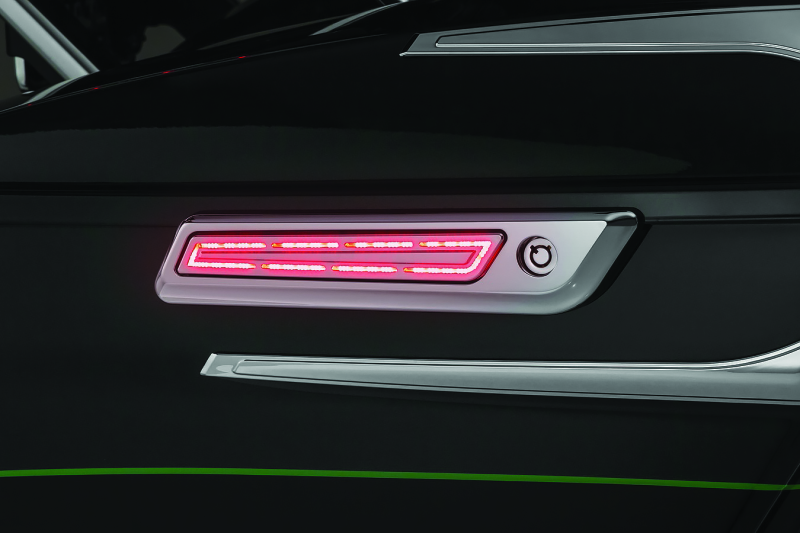 Kuryakyn LED saddlebag hinge accents for Harley Davidson with chip-on-board LED technology, showcasing sleek motorcycle accessory details