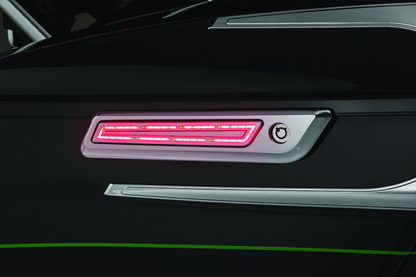 Kuryakyn LED saddlebag hinge accents for Harley Davidson with chip-on-board LED technology, showcasing sleek motorcycle accessory details