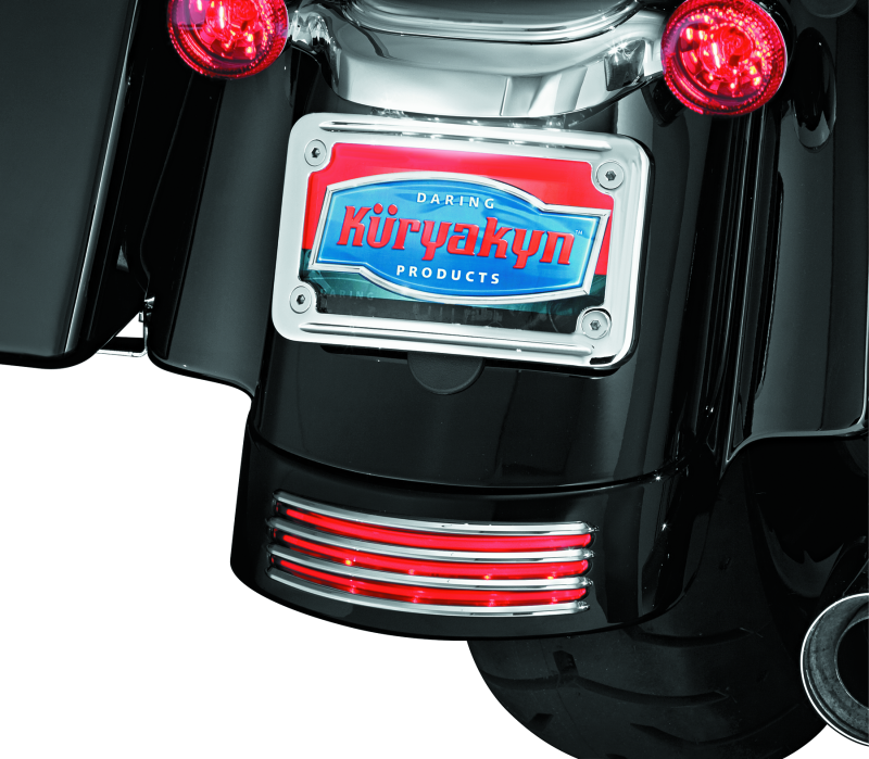 Chrome Kuryakyn rear fender accents for Harley Davidson FLHX and FLTR models, adding a stylish touch to motorcycle fenders.