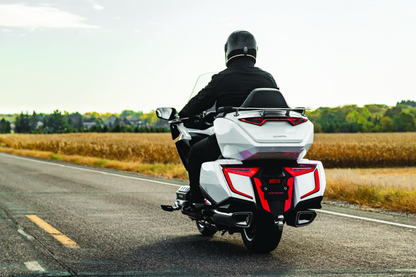 Kuryakyn Omni LED rear bag accents on Honda GL1800 Gold Wing motorcycle, highlighting sleek LED light details on the luggage.