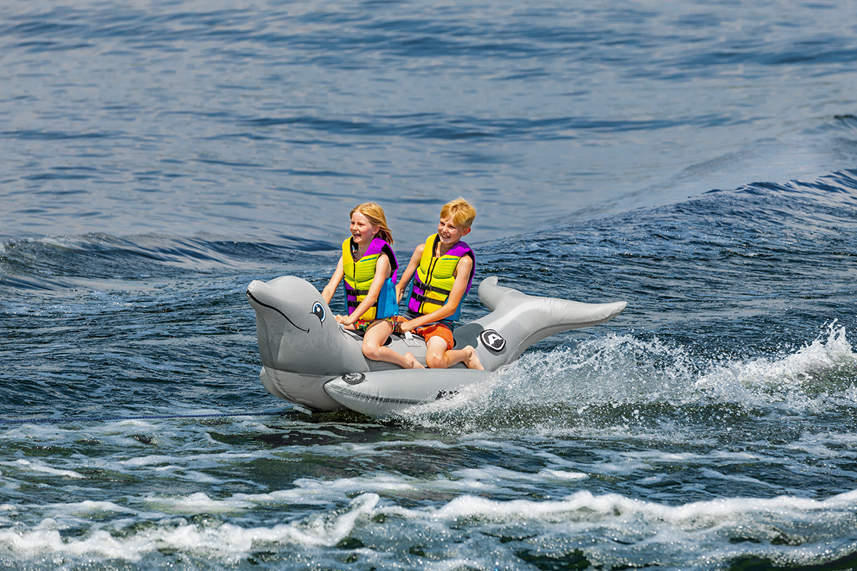 Water towable dolphin riding tube by Bill's Exhausts, designed for fun water sports and tubing adventures.