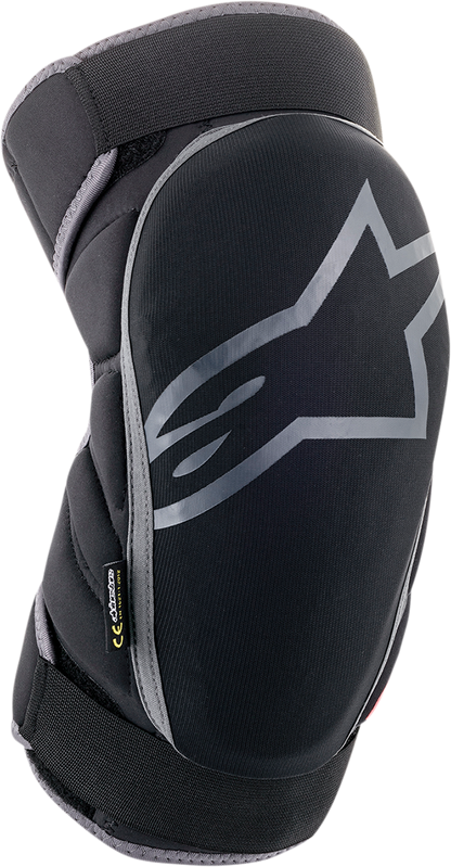 Alpinestars Vector knee guards in black, anthracite, and red, showing protective padding and adjustable straps for knee support.