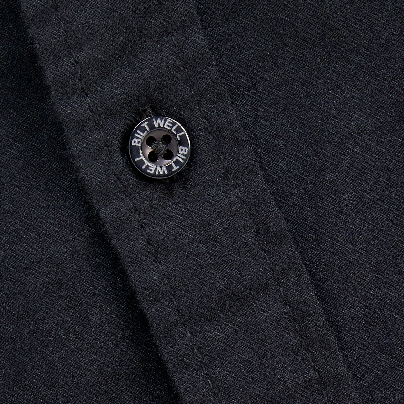 Bill's Exhausts Blackout lightweight flannel shirt in medium size, black and gray plaid fabric, casual style.