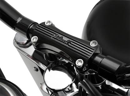 Black BILTWELL Thunder 2-inch handlebar risers for motorcycles, designed to improve riding comfort and handlebar height.