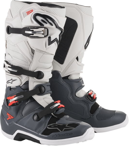 Alpinestars Tech 7 motorcycle boots in gray and white with black accents, US size 8, featuring sturdy ankle protection and rugged soles.