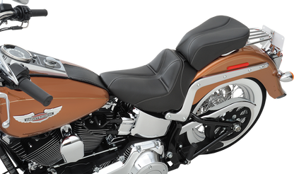 Black SADDLEMEN Dominator Solo Seat with gray stitching for FLSTC/N 2006-2017 motorcycle, featuring stitched leather upholstery.