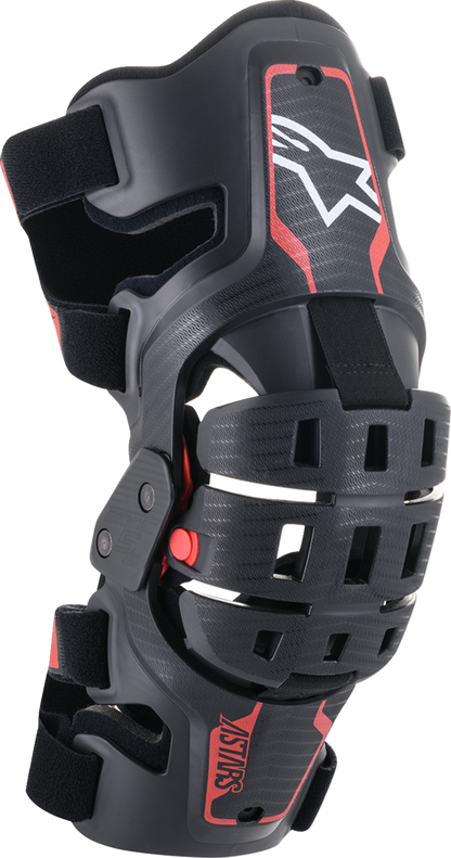 Black and red Alpinstars Youth Bionic 5S knee braces with protective bionic design, shown on a clean background.