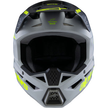 Alpinestars Youth SM3 helmet in matte gray, black, and yellow fluo with ventilation vents and secure chin strap.