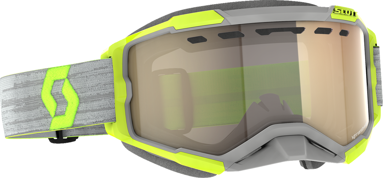 Scott Fury Snow Goggles with light-sensitive lenses in gray/yellow and bronze chrome, designed for winter sports.