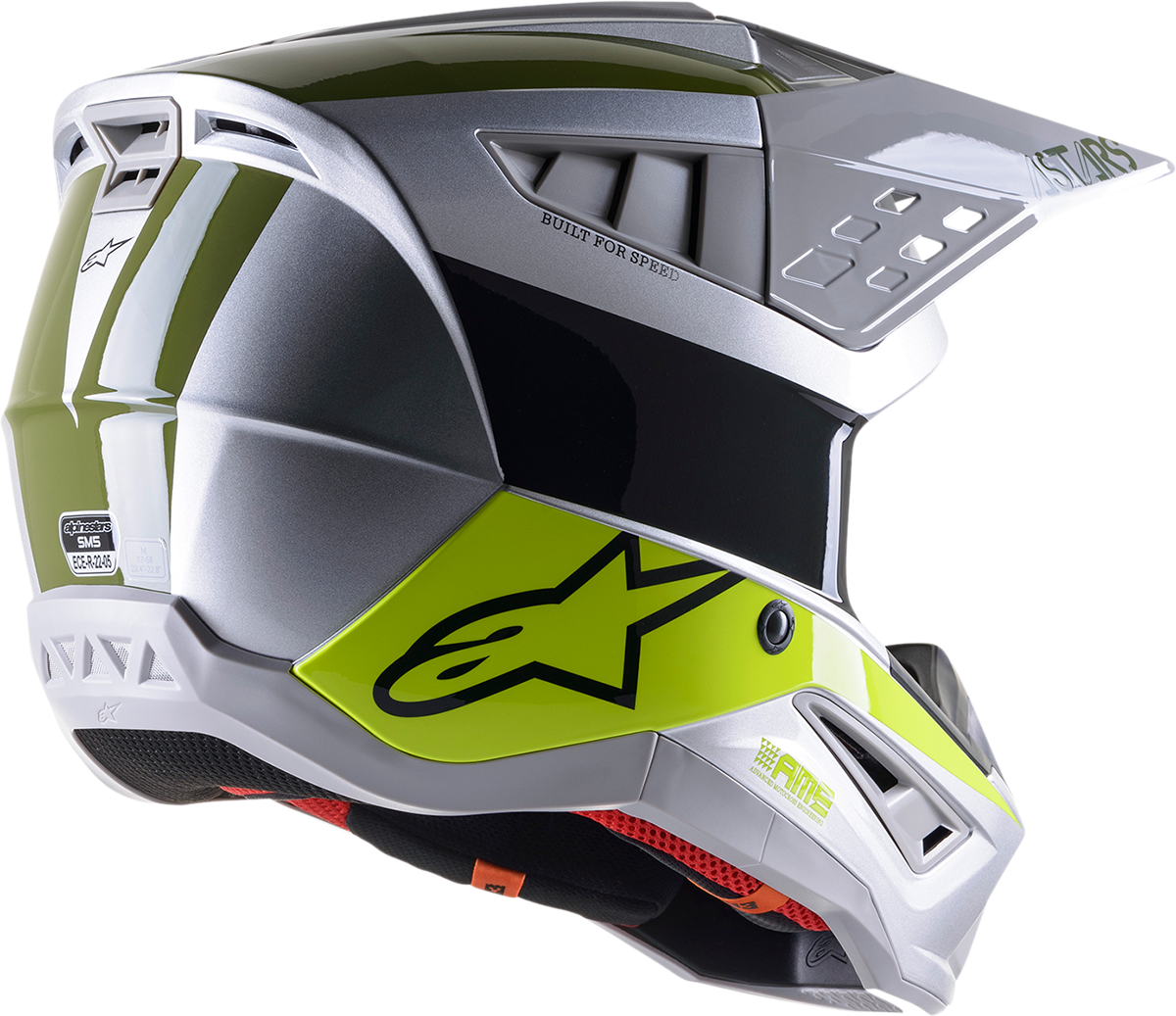 Alpinestars SM5 Bond helmet in silver, yellow, and green with a sleek design, size medium, shown from a side angle.