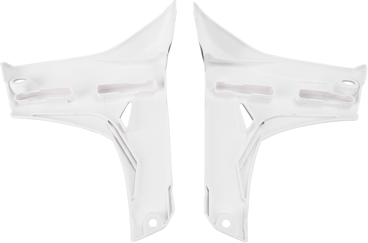 White Acerbis radiator shrouds for motorcycle lower body, designed for durable protection and sleek appearance.