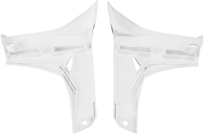 White Acerbis radiator shrouds for motorcycle lower body, designed for durable protection and sleek appearance.