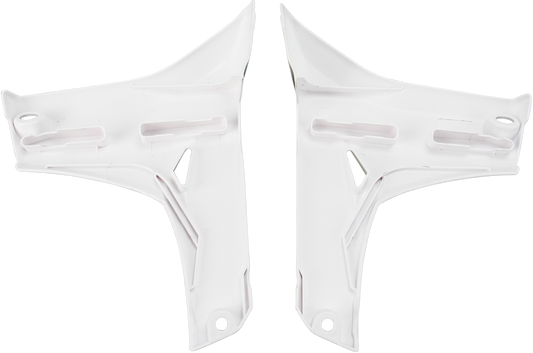 White Acerbis radiator shrouds for motorcycle lower body, designed for durable protection and sleek appearance.