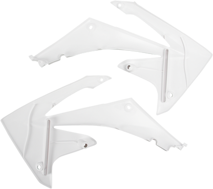 White ACERBIS radiator shrouds for motorcycle body, designed for optimal airflow and protection.