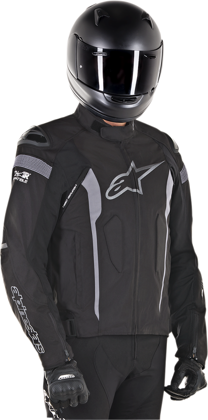 Alpinestars T-Missile Drystar jacket in black and black, 2XL, featuring protective motorcycle gear with visible branding and textured fabric.