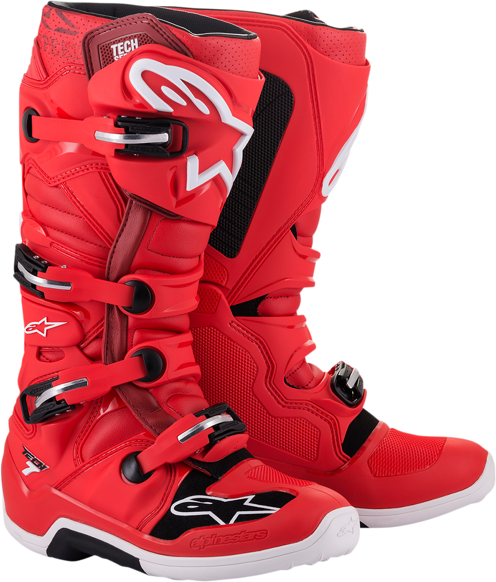 Alpinestars Tech 7 motocross boots in red with black accents, US size 14, designed for off-road riding and protection.