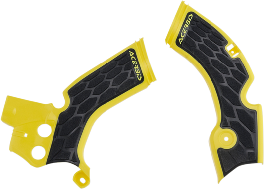ACERBIS X-Grip Frame Guards in yellow and black on a motorcycle body, designed to protect the frame during riding.