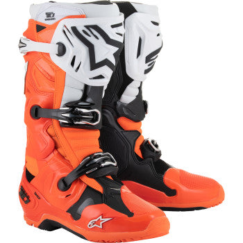 Alpinestars Tech 10 Enduro motorcycle boots in fluorescent orange, black, and white with sturdy design and protective features.
