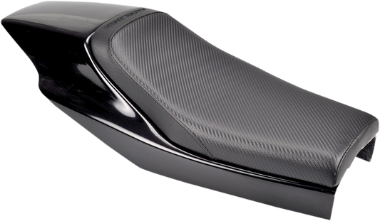 Black Saddlemens Eliminator Seat with carbon fiber detailing for Z4203 motorcycle, showcasing sleek, contoured design and stitching.