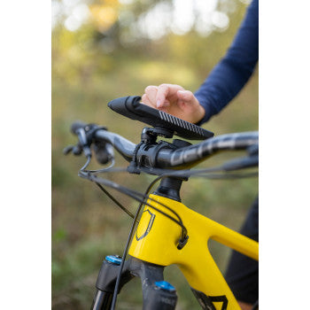 Bill's Exhausts SP CONNECT 52302 phone mount attached to a motorcycle handlebar for secure device use.
