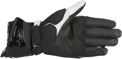 Alpinestars Supertech motorcycle gloves in black and white, 3XL size, featuring protective design and high-performance materials.