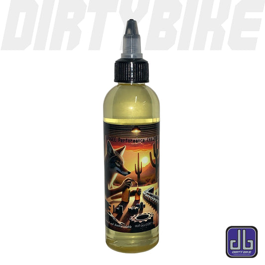 eDirtyBike Apogee Performance Chain Lube bottle, lubricant for bike chains, with a nozzle for easy application.