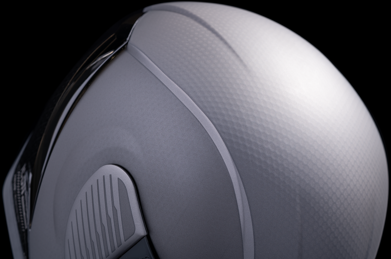 Silver ICON Airform™ Helmet with MIPS® technology, Counterstrike design, small size, featuring sleek helmet shape and ventilation.