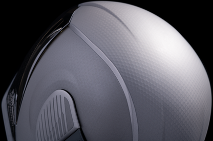 Silver ICON Airform™ Helmet with MIPS® technology, Counterstrike design, small size, featuring sleek helmet shape and ventilation.