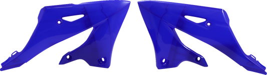 Acerbis radiator shrouds in blue for Yamaha YZ125/250 motocross bikes, 2022-2023 model, featuring aerodynamic body design.