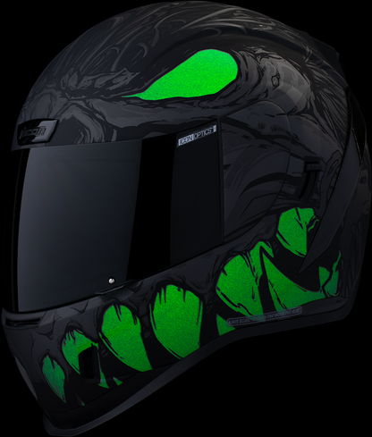Dark black ICON Airform™ helmet with MIPS® technology, medium size, featuring a sleek design and adjustable straps.