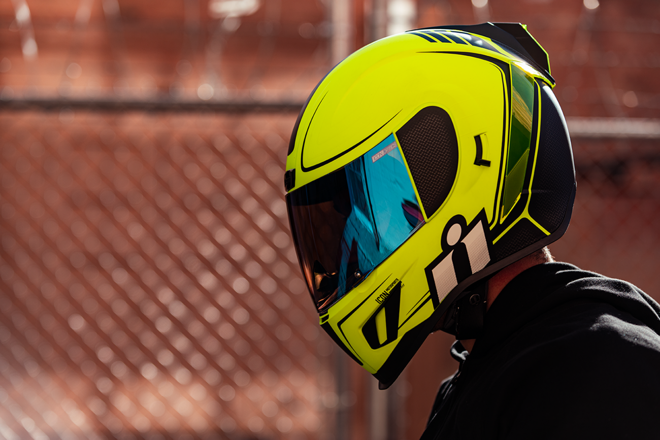 Bill's Exhausts ICON Airform™ Helmet Resurgent Hi-Viz XS with reflective visor and vibrant design, lightweight motorcycle helmet.