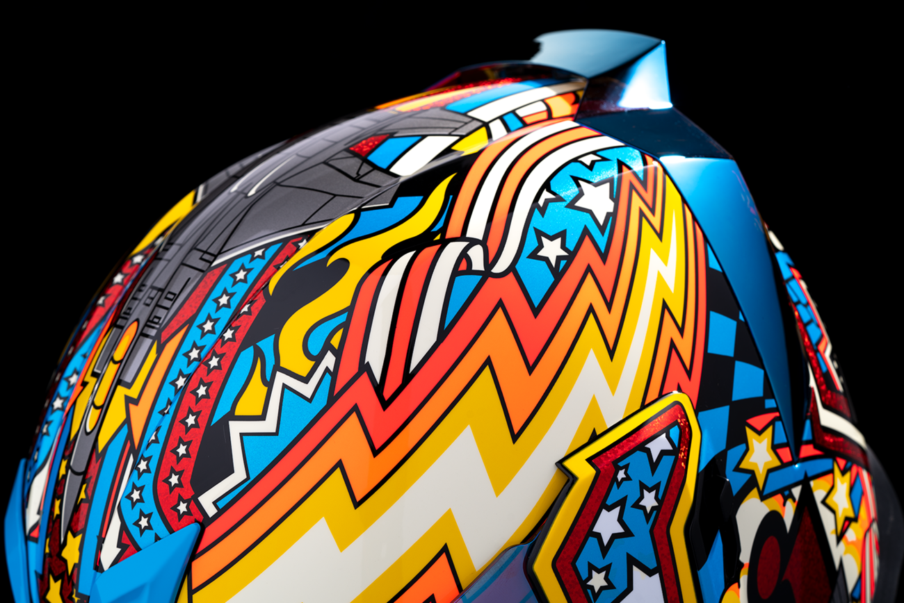 Blue ICON Airflite™ Flyboy helmet in medium size, featuring sleek aerodynamic design and detailed graphics.
