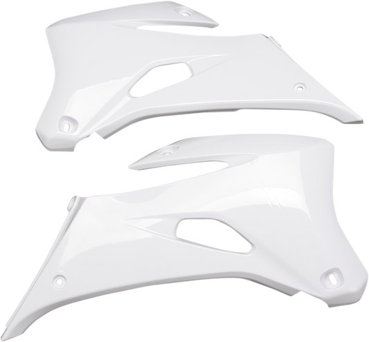 White Acerbis radiator shrouds for motorcycle body protection, featuring sleek design and durable construction.