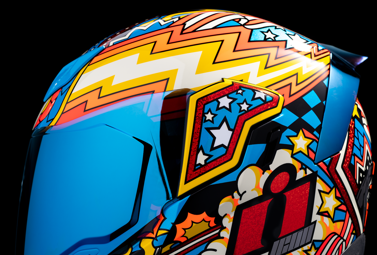 Blue ICON Airflite™ Flyboy helmet in 3XL size with aerodynamic design and bold graphics, featuring a clear visor and ventilation vents.