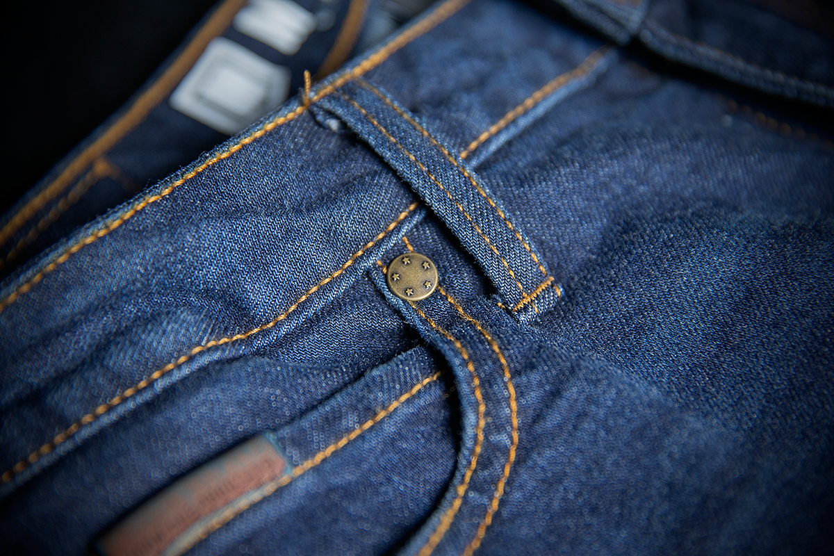 ICON Women's MH1000™ Blue Jeans by Bill's Exhausts, showing the classic fit and denim fabric in a natural pose.