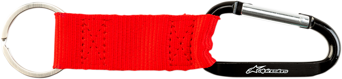 Red Alpinstars key fob snap hook, a durable protective gear accessory with a secure clip for key or gear attachment.