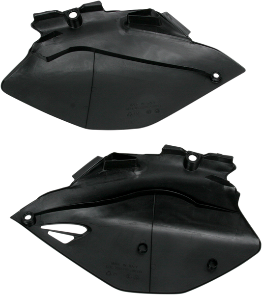 Acerbis black body side panels for motorcycle, showing sleek black plastic panels with mounting points and Acerbis branding.