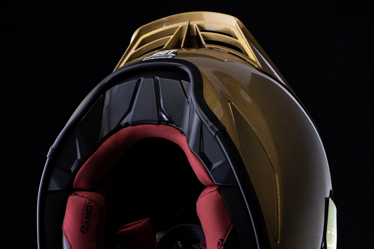ICON Domain™ Cornelius helmet in gold, small size, featuring a sleek design and sturdy construction by Bill's Exhausts.