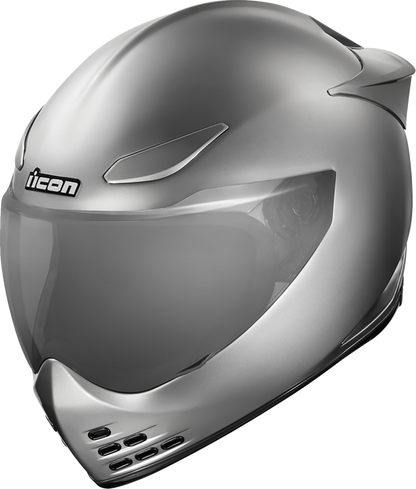 Silver ICON Domain™ Helmet Cornelius style in large size with sleek design, featuring the iconic graphics on the helmet surface.