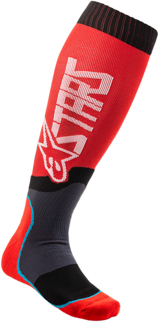 Alpinestars MX Plus 2 motocross socks in red and white, large/2XL size, featuring breathable fabric and reinforced areas.